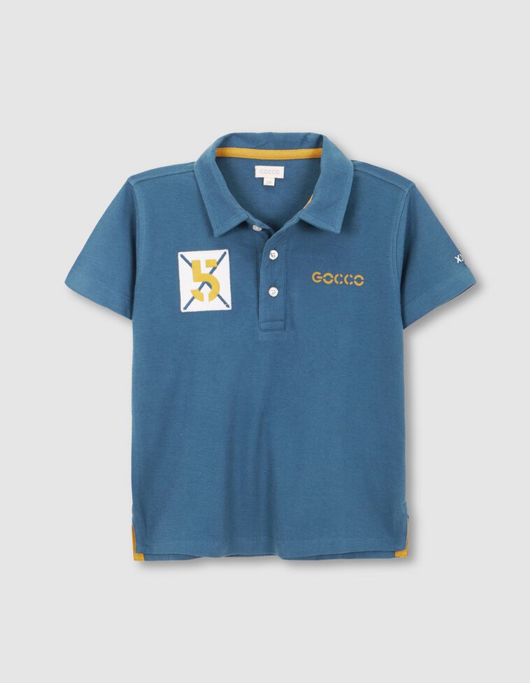 Polo con parches azul claro