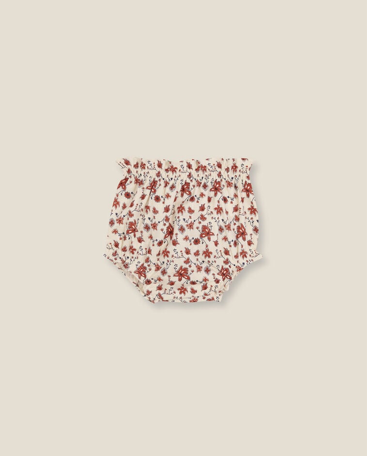 Pantal&oacute;n de flores amarillo reci&eacute;n nacido
