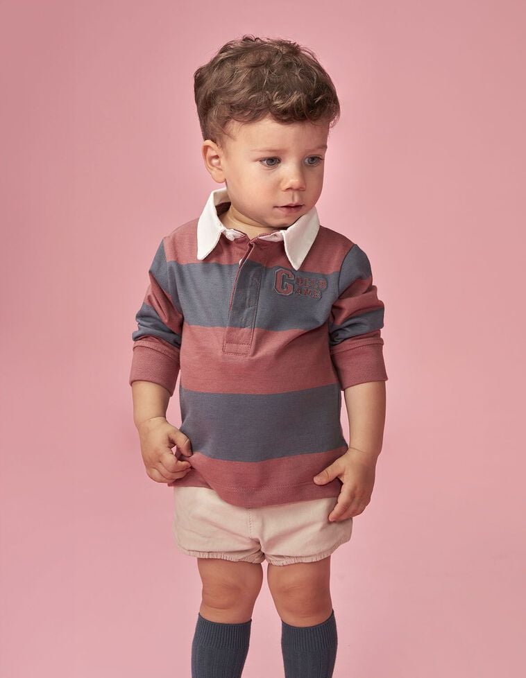 Polo de rayas con parche rosa