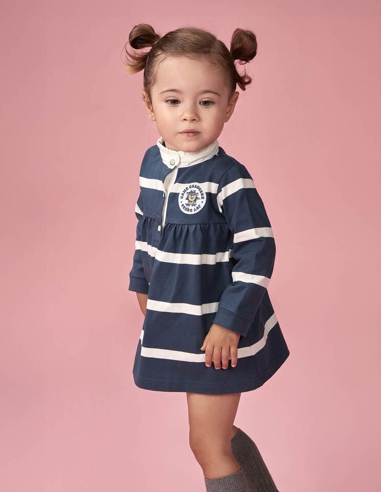 Vestido polo con parche gráfico azul