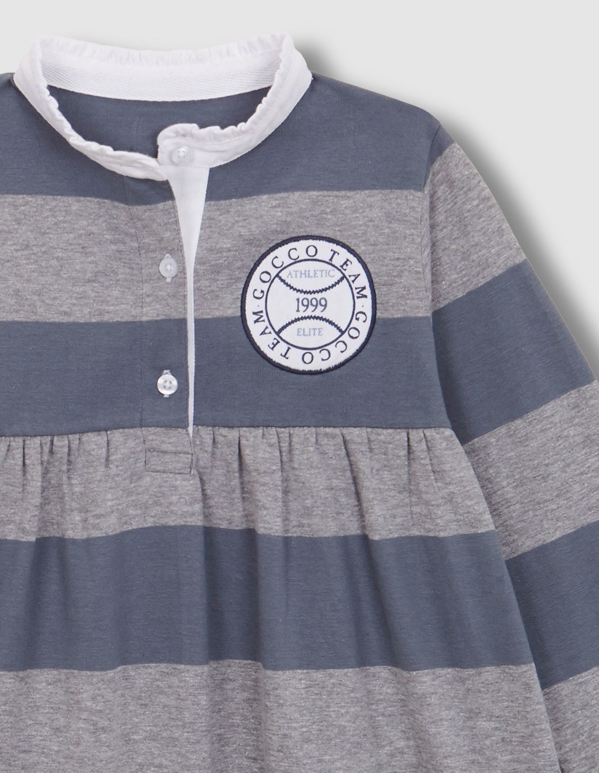 Vestido polo de rayas con parche azul para nina infantil
