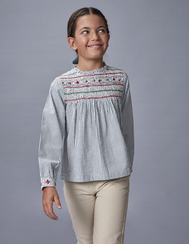 Blusa de rayas con nido de abeja a mano azul claro Blusa de rayas con nido de abeja a mano azul claro