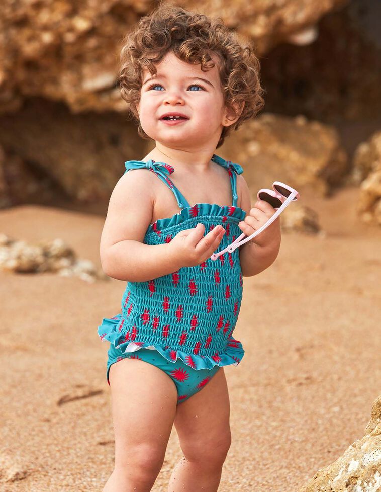 Bañador smock de soles azul claro