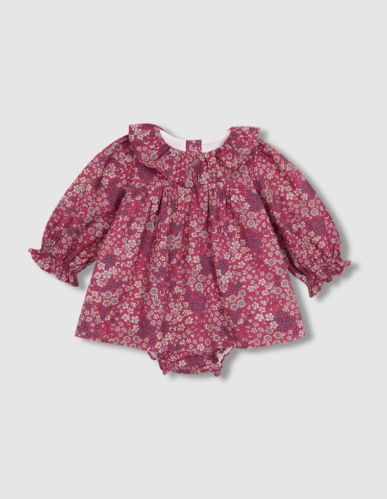 Vestido de flores con cuello volante y lazo rosa