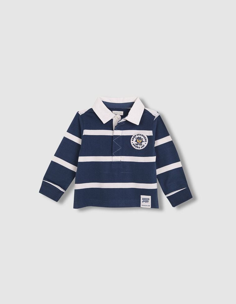 Polo de rayas con parche gráfico azul