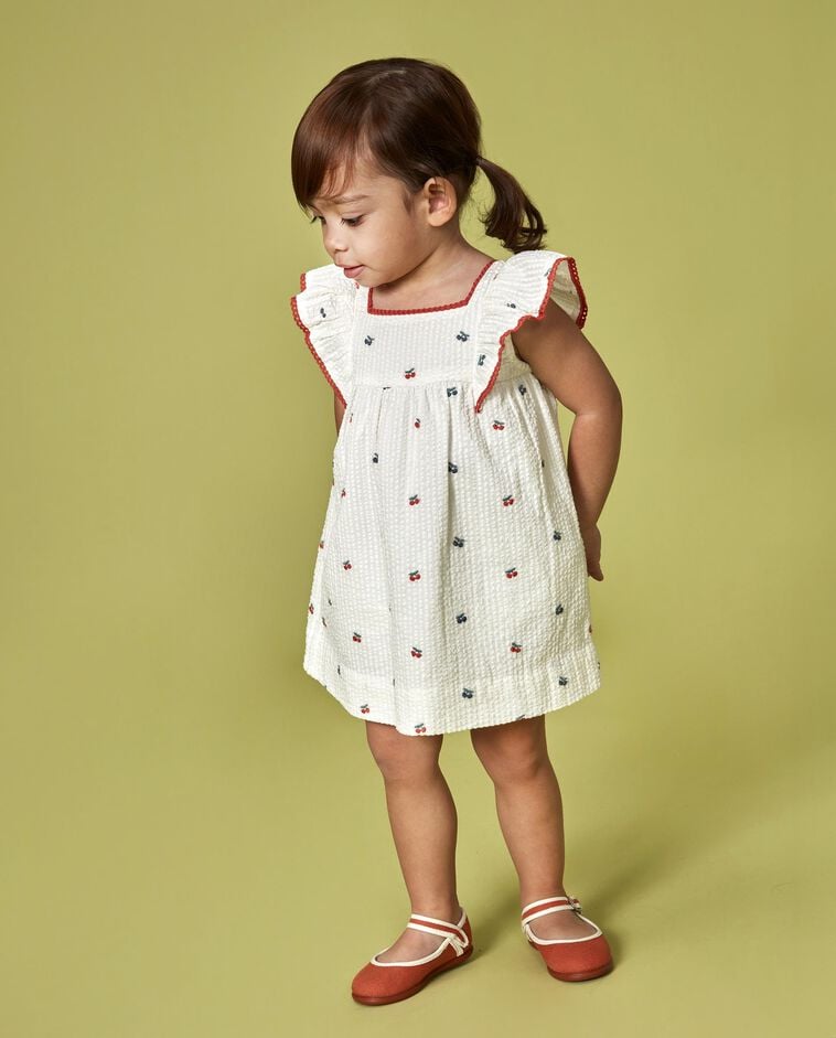 Vestido estampado con volante blanco