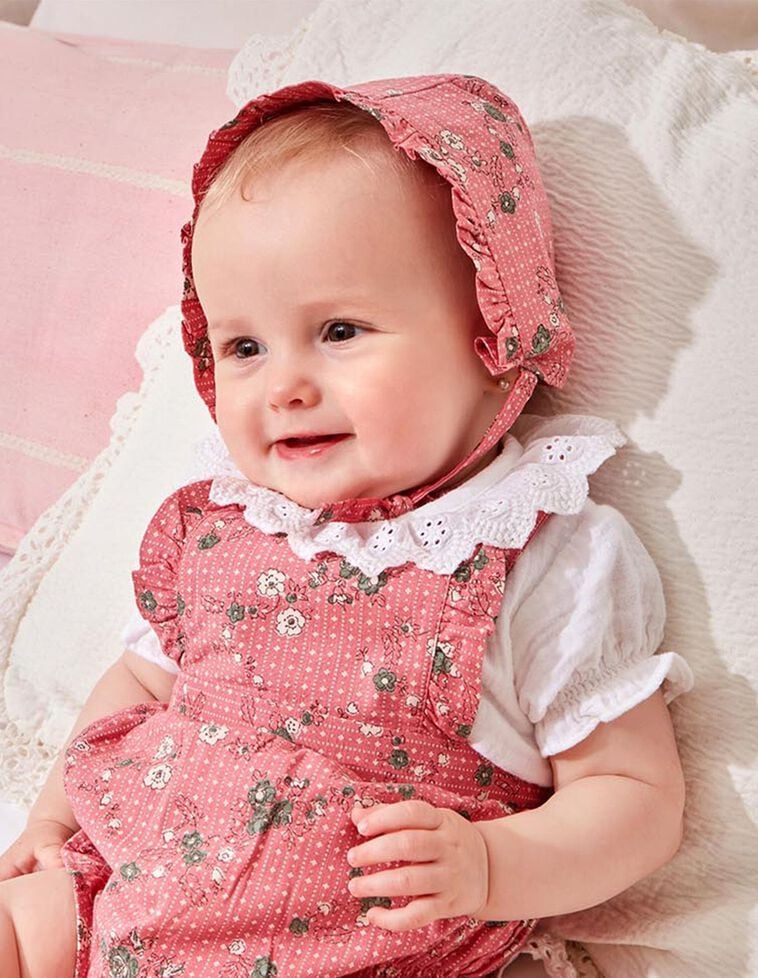 Capota estampado de flores con volante rosa