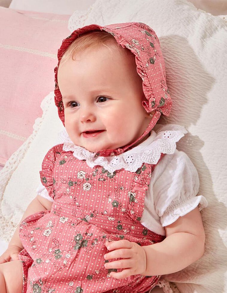 Capota estampado de flores con volante rosa
