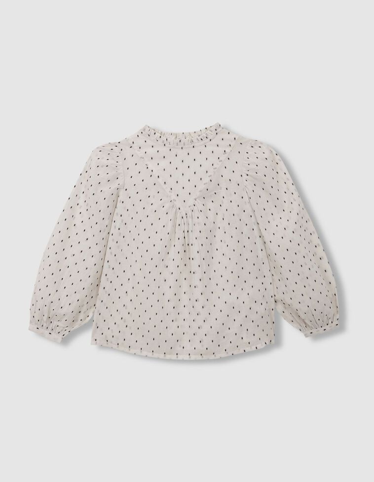 Blusa blanca de plumeti con detalles negros