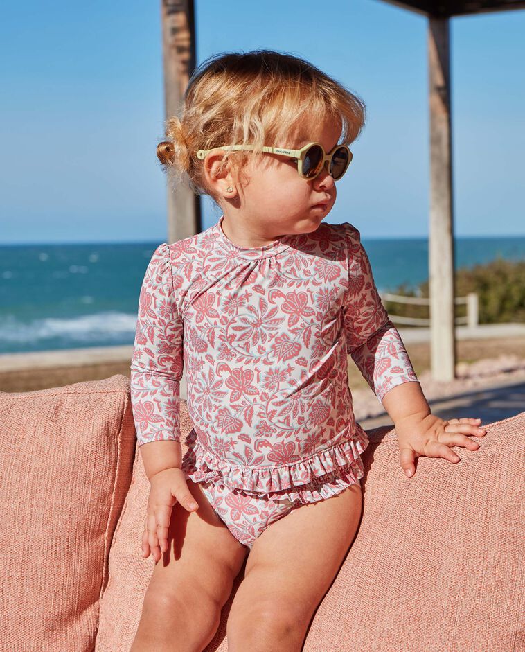 Camiseta de ba&ntilde;o beige con protecci&oacute;n solar estampado flores