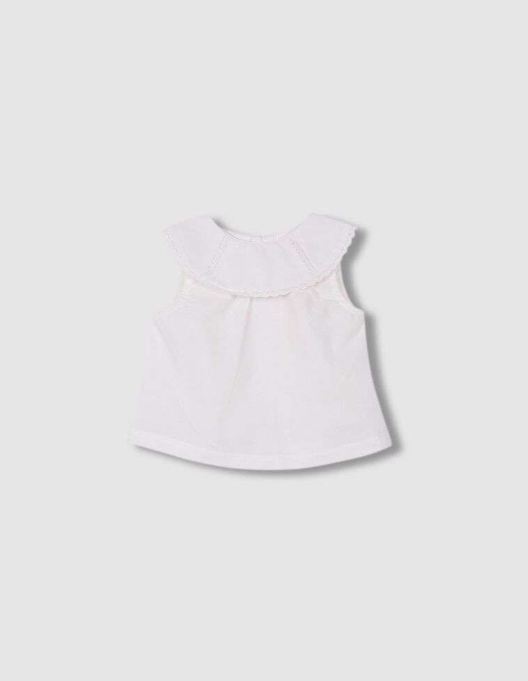Blusa cuello tiras bordadas en blanco roto
