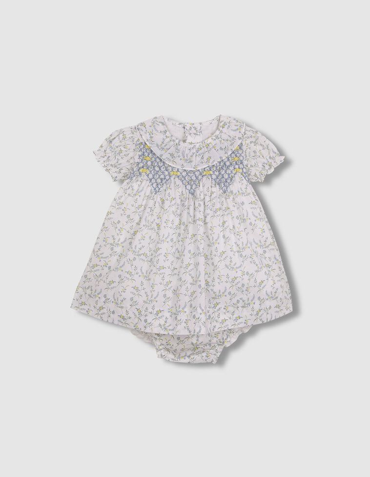 Vestido de florecitas con nido de abeja a mano azul