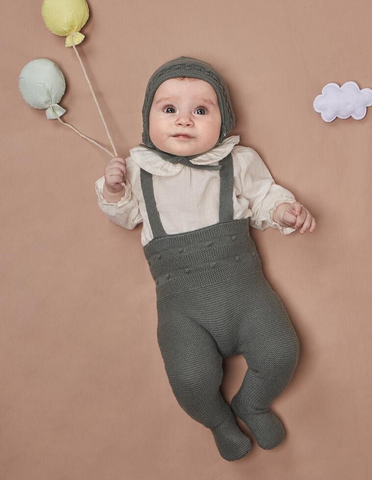 Peto largo con lana detalles de punto de arroz y bodoques verde oscuro