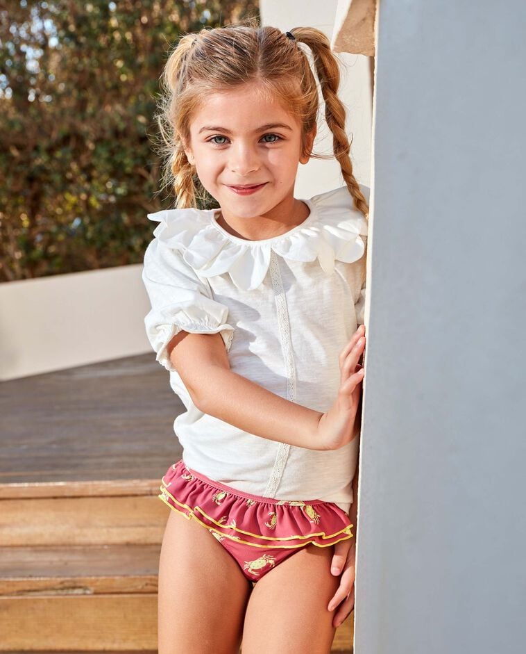 Culetin de rayas con volante coral