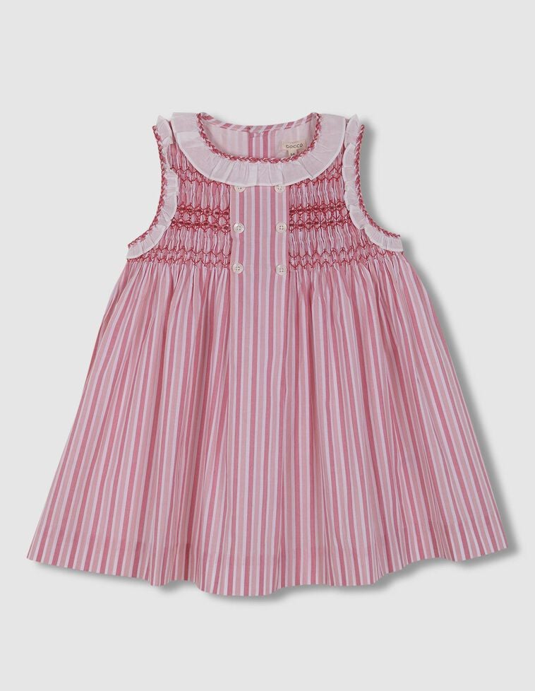 Vestido de rayas con nido de abeja a mano y volantes rosa