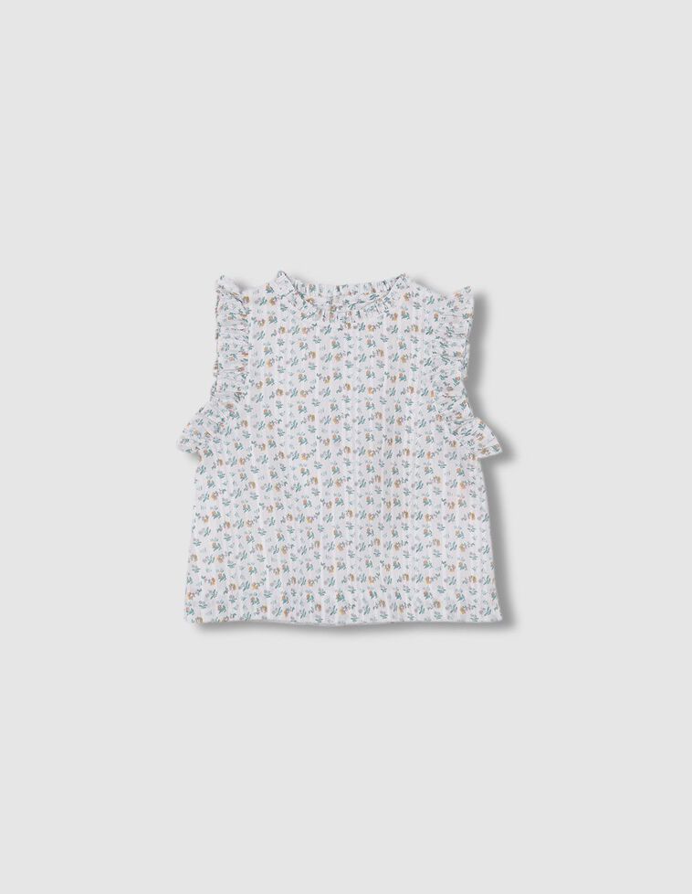 Blusa estampada con volante en el cuello y en las sisas blanco