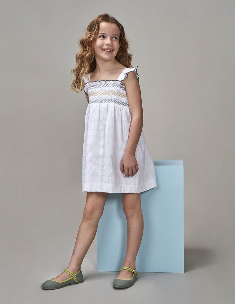 Vestido blanco con elasticos en contra blanco